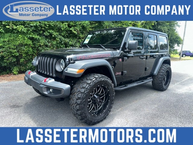 2018 Jeep Wrangler Unlimited Rubicon in Black — front three-quarter view