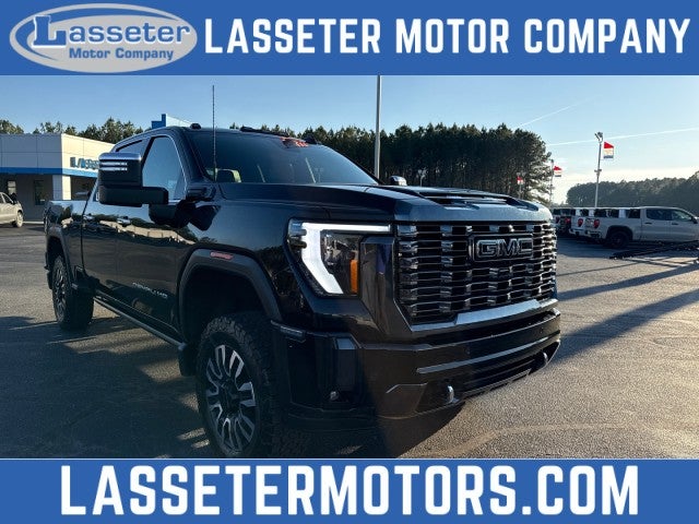 2024 GMC Sierra 2500 HD Denali Ultimate in Onyx Black — front three-quarter view