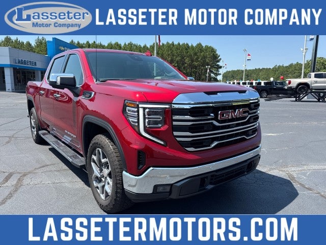 2026 GMC Sierra 1500 SLT in Volcanic Red Tintcoat — front three-quarter view