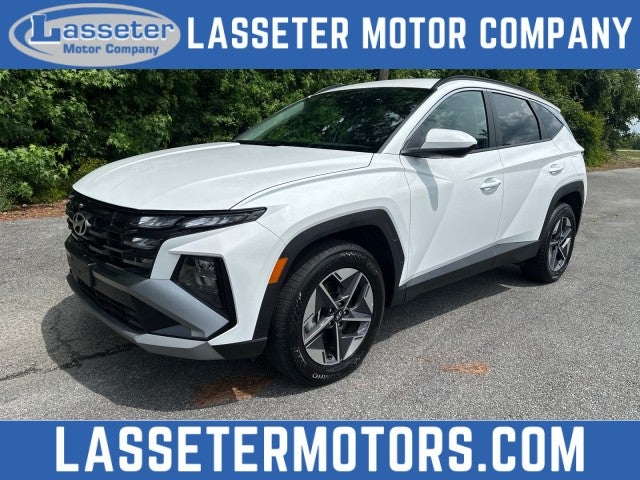 2026 Hyundai Tucson SEL in White — front three-quarter view